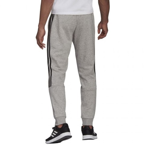 Spodnie adidas Essentials Tapered Cuff 3 Stripes M GK8976 Spodnie adidas Essentials Tapered Cuff 3 Stripes M GK8976