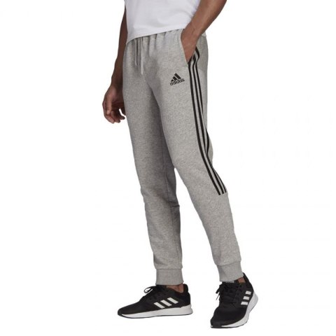 Spodnie adidas Essentials Tapered Cuff 3 Stripes M GK8976 Spodnie adidas Essentials Tapered Cuff 3 Stripes M GK8976
