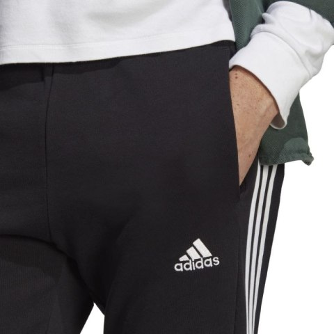 Spodnie adidas Essentials French Terry Tapered Cuff 3-Stripes M IC0050 Spodnie adidas Essentials French Terry Tapered Cuff 3-Stripes M IC0050