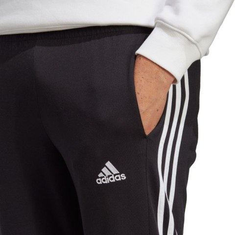 Spodnie adidas Essentials Single Jersey Tapered Open Hem 3-Stripes M IC0044 Spodnie adidas Essentials Single Jersey Tapered Open Hem 3-Stripes M IC0044