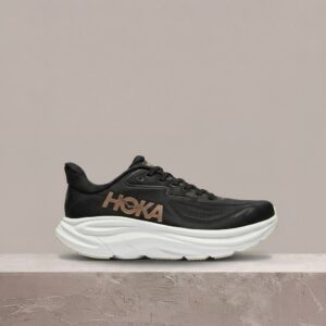 Hoka Clifton 10 Black Rose Gold, dropem na jubileusz linii, sylwetka unisex, grube ale lekkie, 1162031-BRGL