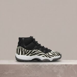 Air Jordan 11 Animal Instinct, damska sylwetka, czarno-biała kolorystyka, zwierzęce printy, drop 2021, AR0715-010
