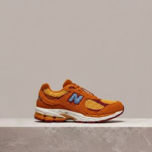New Balance 2002R, Salehe Bembury, Peace be the Journey, drop kolekcjonerski, sylwetka unisex, pomarańcz z żółtym ML2002R1