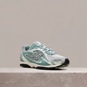 204L Kith Green od New Balance, unisex, szaro-turkusowa kolorystyka, limitka z Ronniem Fiegiem, retro silhouette, U204LKTA