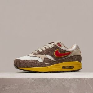 Nike Air Max 1 Swoosh Big Head Origins, limitowany drop, pikselowa sylwetka, brąz żółć, unisex HV5776-200